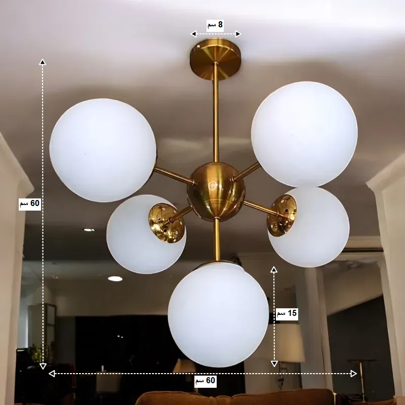 نجفة معدنية كلوبات كروية 5 ذراع بتصميم عصري موديل 028952 صورة توضيحية لأبعاد النجفة القياسية. تتضمن عرض= 60 سم، ارتفاع= 60 سم، وقطر الكرة الزجاجية= 15 سم، قطر الطبق العلوى= 8 سم.