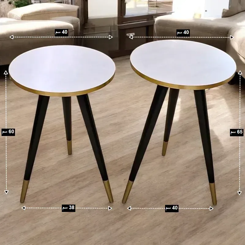 طقم ترابيزات جانبية متداخلة، موديل 029528 أبعاد طقم الترابيزات كما تظهر على الصورة. أبعاد الترابيزة الأطول: قطر السطح: 40 سم، الارتفاع الإجمالي: 65 سم، عرض قاعدة الساق: 40 سم. أبعاد الترابيزة الأقصر: قطر السطح: 40 سم، الارتفاع الإجمالي: 60 سم، عرض قاعدة الساق: 38 سم.