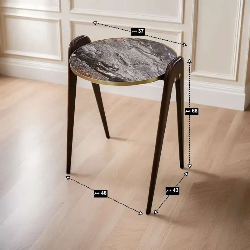 ترابيزة جانبية دائرية بسطح رخامي، موديل 029527، قطر 43 سم أبعاد الترابيزة كما تظهر على الصورة: قطر السطح= 37 سم، ارتفاع= 68 سم، العمق = 43 سم، البعد بين الأرجل= 48 سم.