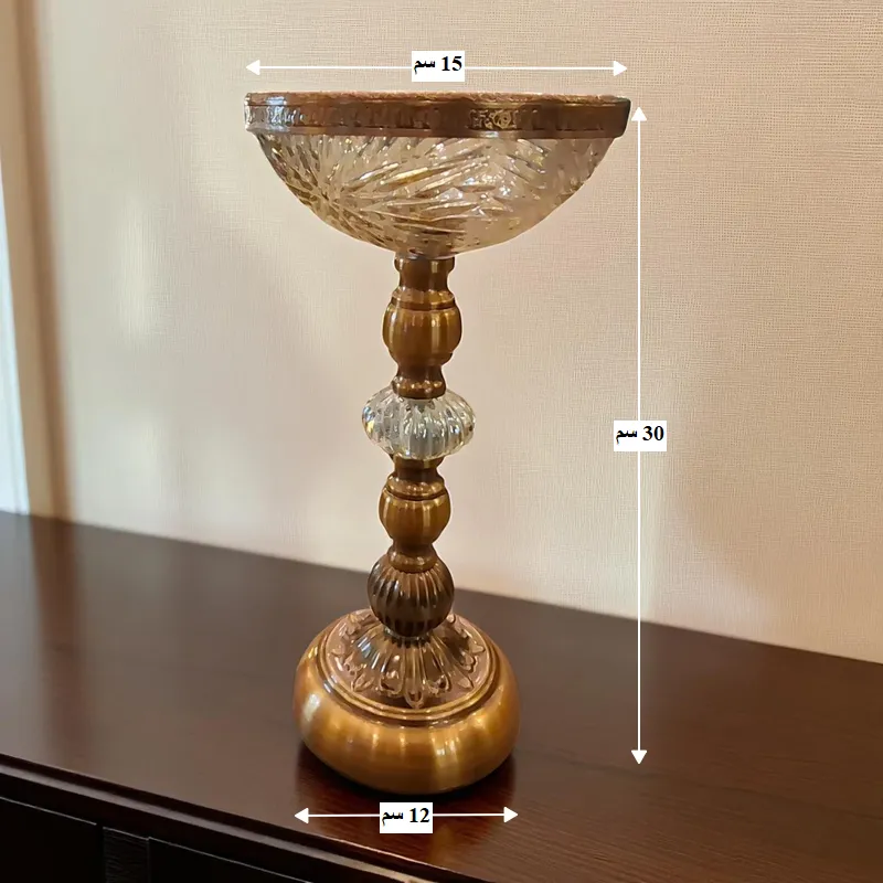 أبعاد حامل شموع زجاجي ومعدني (ارتفاع 30 سم، قطر علوي 15 سم، قطر قاعدة 12 سم)