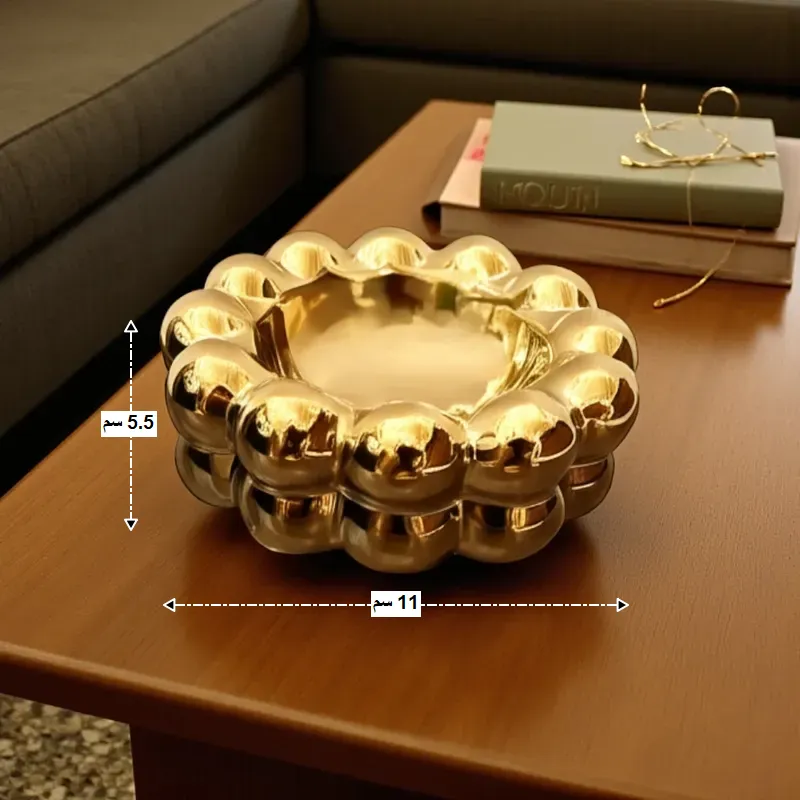 إخوان سرور الإضاءة الحديثة والديكور صورة توضح أبعاد منفضة السجائر البورسلين، بقطر 11 سم وارتفاع 5.5 سم.