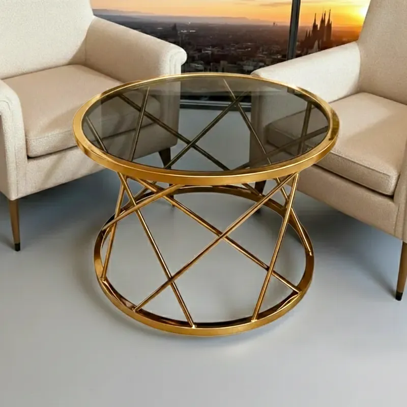 إخوان سرور الإضاءة الحديثة والديكور ترابيزة قهوة مستديرة ستانلس ستيل ذهبية فاخرة بتصميم هندسي و سطح زجاجي مدخن