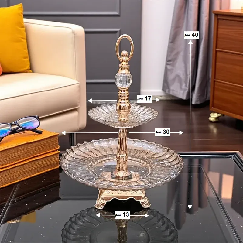 إخوان سرور الإضاءة الحديثة والديكور أبعاد شيالة الكريستال: الارتفاع الكلي 40 سم، قطر الطبق العلوي 17 سم والسفلي 30 سم، وأبعاد القاعدة 10*10 سم.